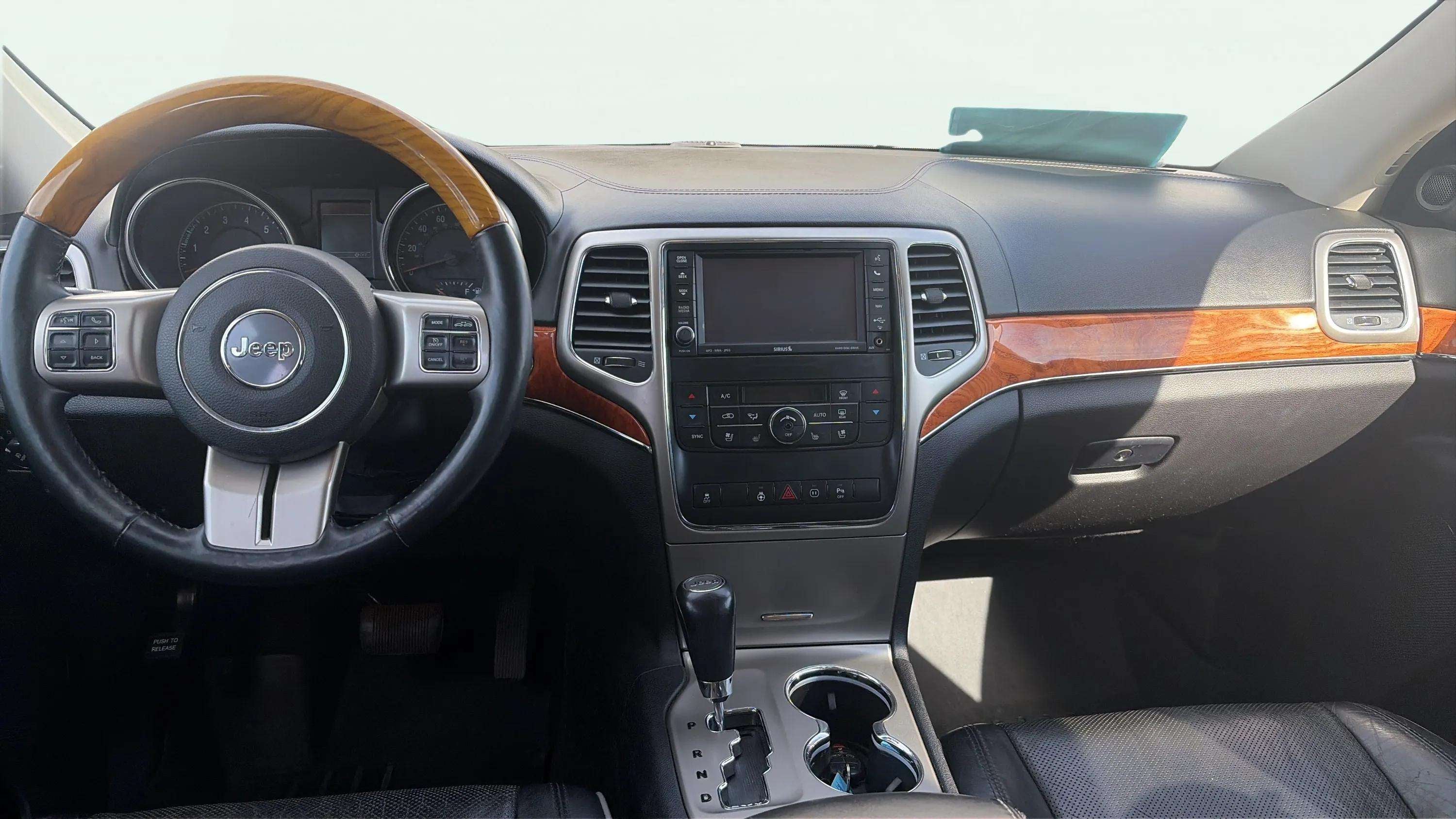 Used 2012 Jeep Grand Cherokee Overland with VIN 1C4RJFCG6CC316635 for sale in Mobridge, SD