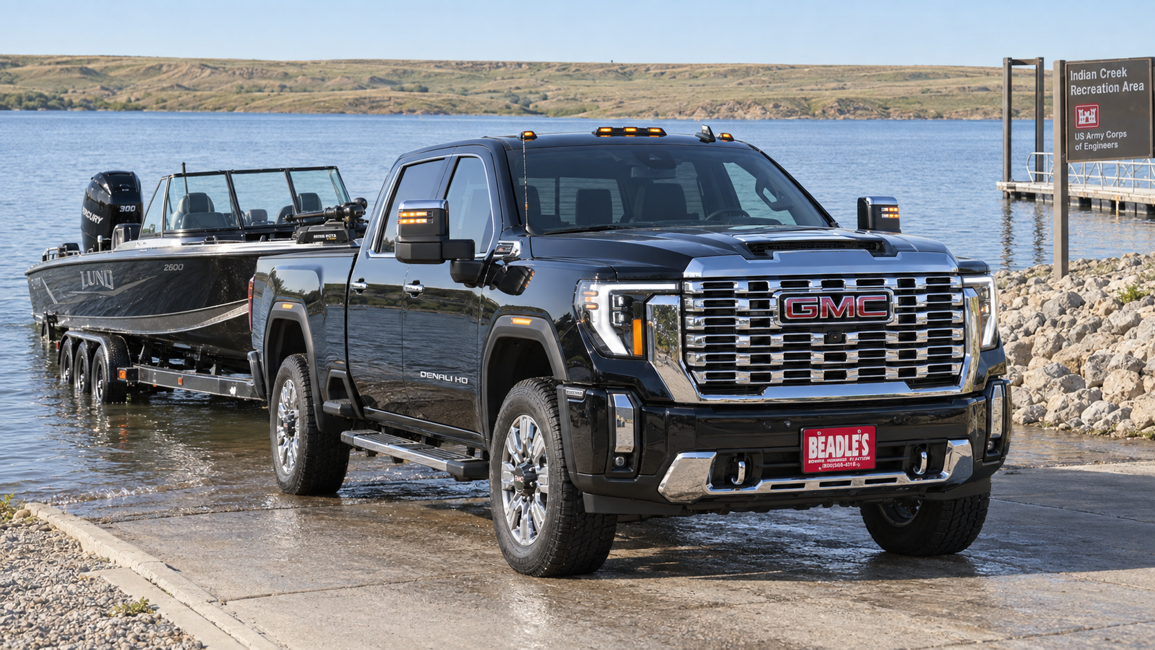 2026 GMC Sierra 2500 HD Denali backing a walleye boat down the ramp at Indian Creek on Lake Oahe near Mobridge, South Dakota